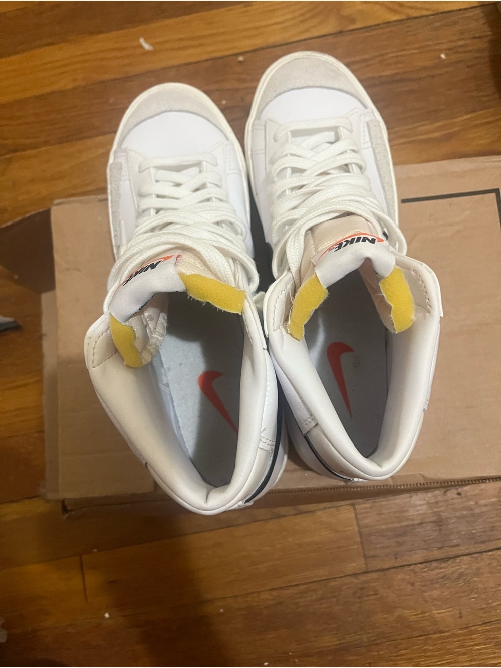 Nike Kids White High-Top Sneakers with Orange Swoosh